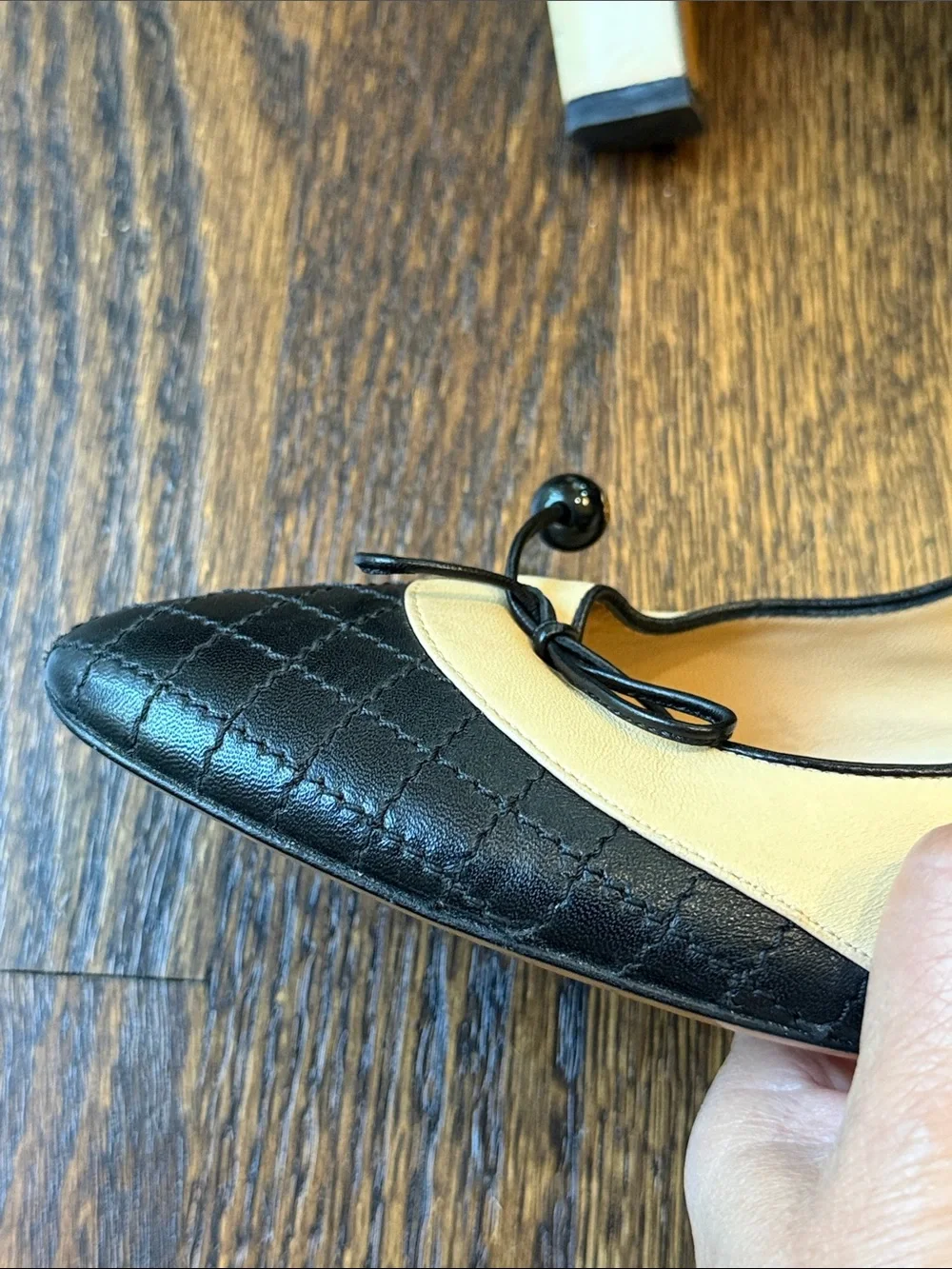 CHANEL Beige and Black Quilted Cap-Toe Bow Pumps size 39